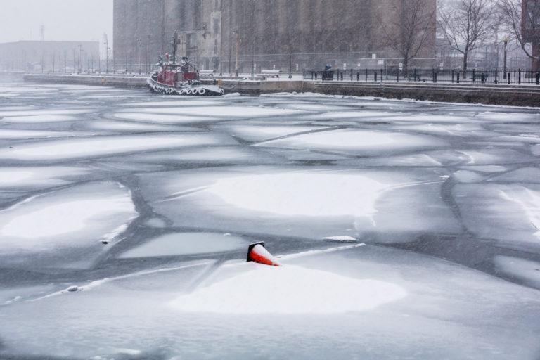 Pylon and Tugboat in the Snow
