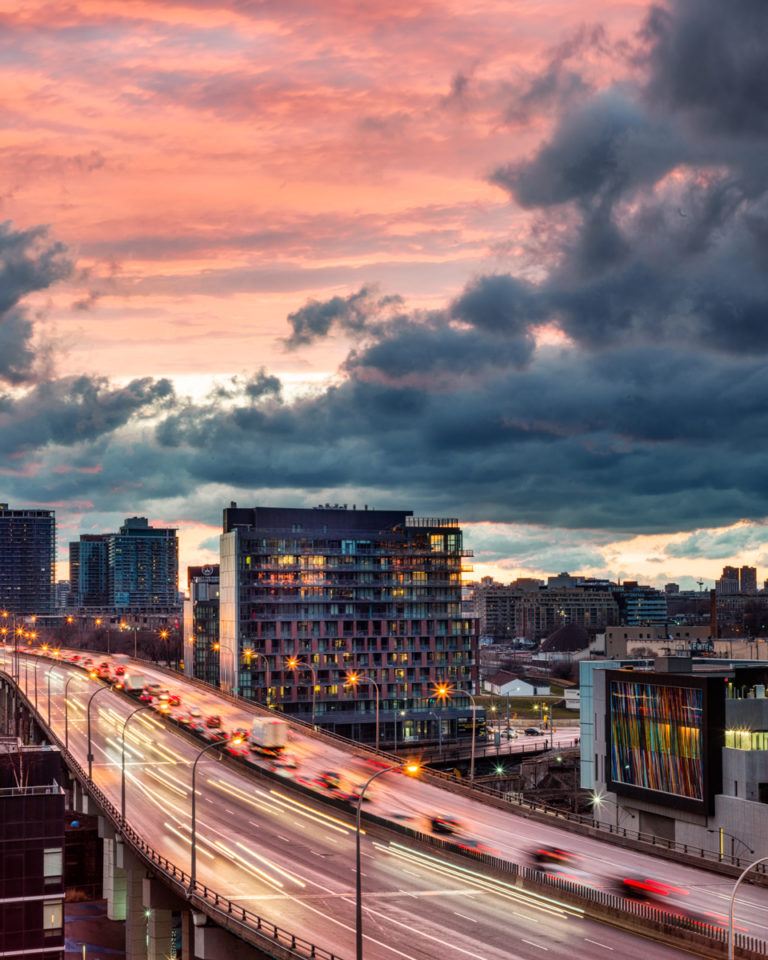 Colorful Sunset and Traffic on Elevated Highway