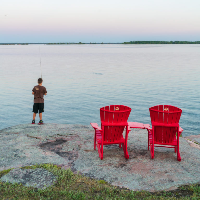 Boy Fishing and Red Chairs