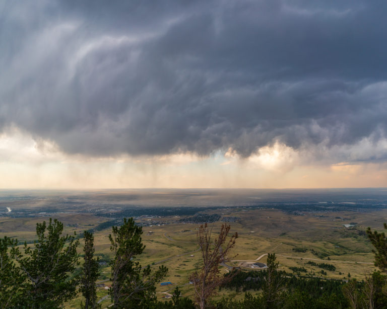 Clouds and Rain Over Small City