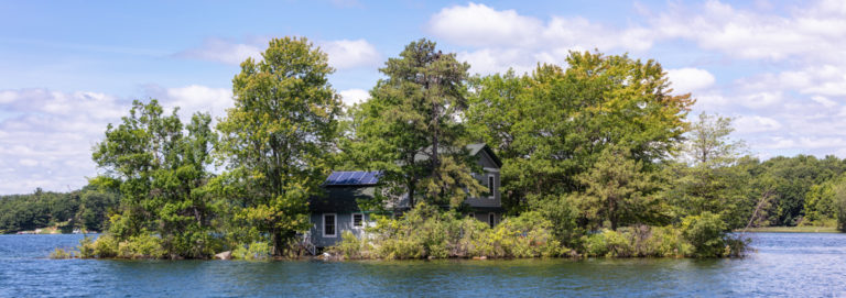 Cottage with Solar Panels on Small Island