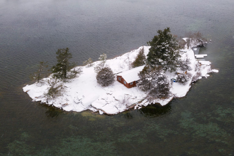 Cottage and Snow Covered Island