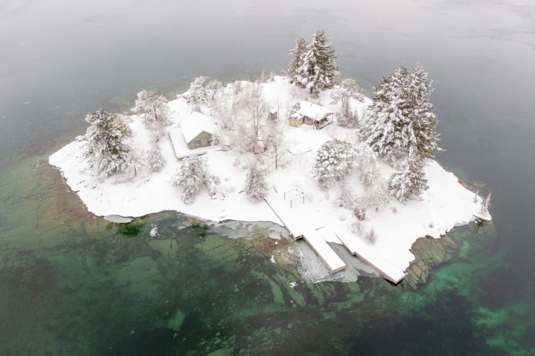Cottage and Snow Covered Island