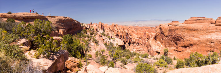 Narrow Rock Wall Fins and Hikers