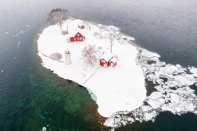 Cast Iron Lighthouse and Snowy Surroundings