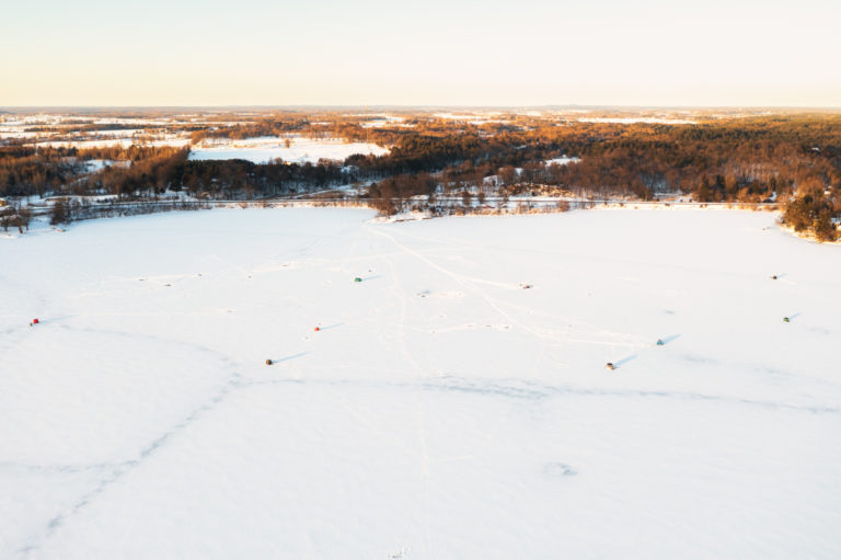 Colorful Solitude: Ice Fishing Huts