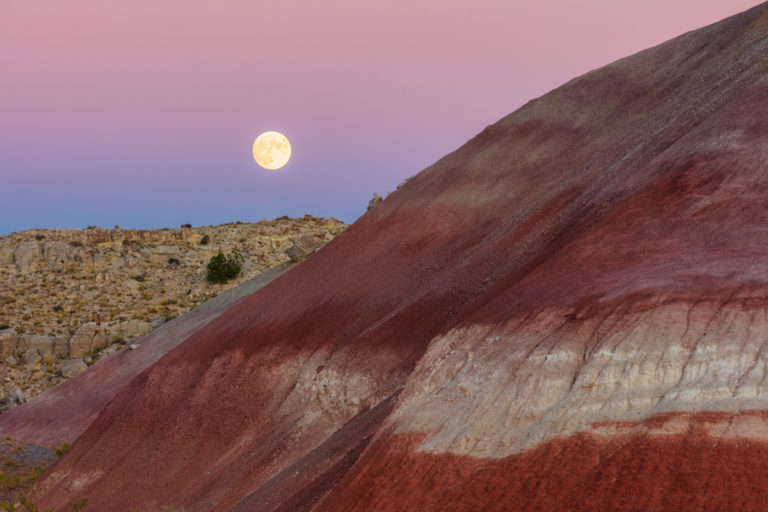 Pastel Skies Over Red Earth