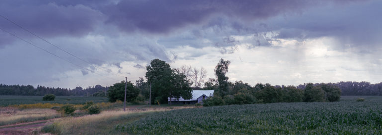 Dramatic Sky Over Rural Farmhouse