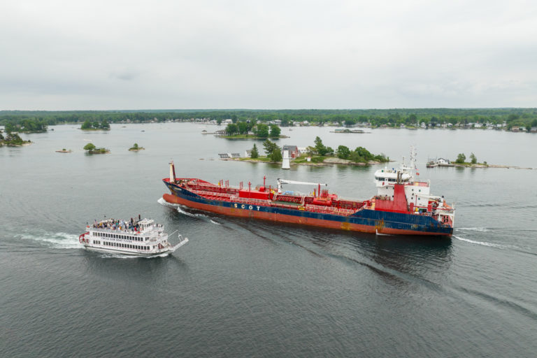 Tour Boat and Tanker Passing Rock Island Lighthouse
