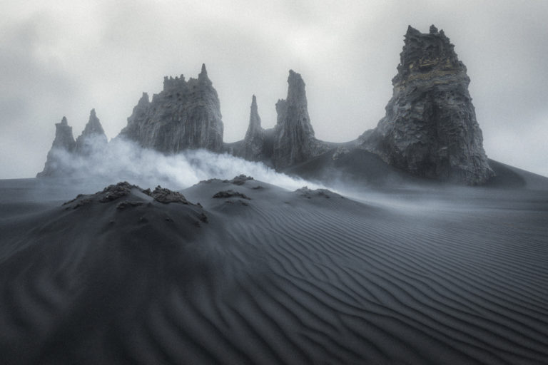 Alien Rock Formations in a Misty Desertscape