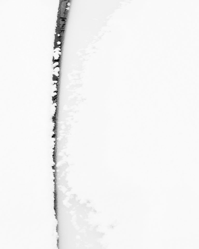 Snow-Covered Ice with Subtle Divide