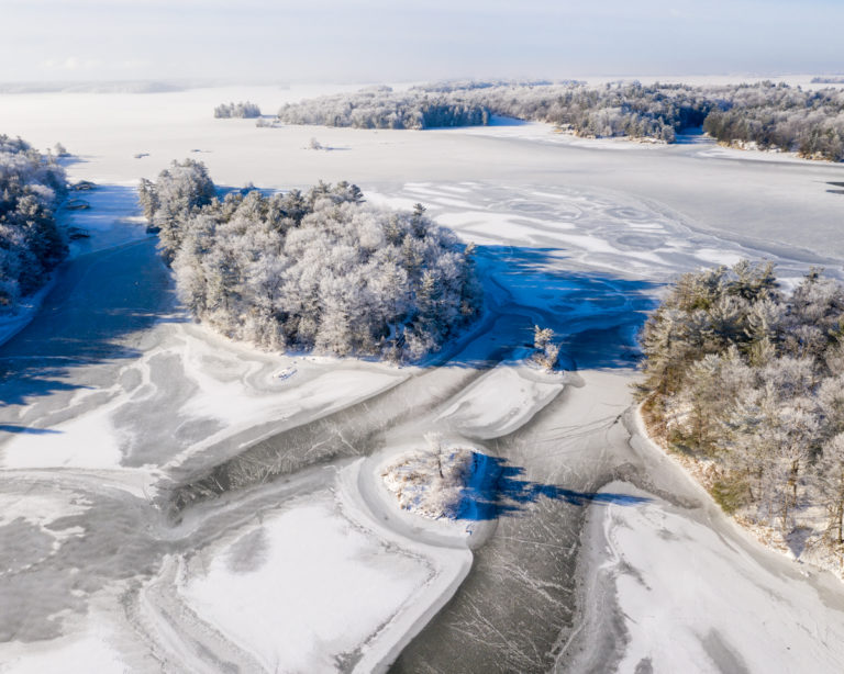 Frosty Islands and Frozen Channels in Winter’s Grasp