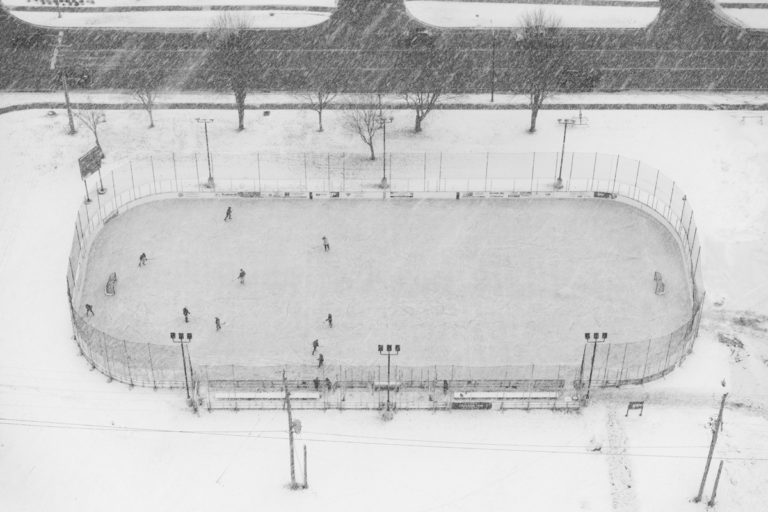 Outdoor Hockey Rink in Heavy Snowfall