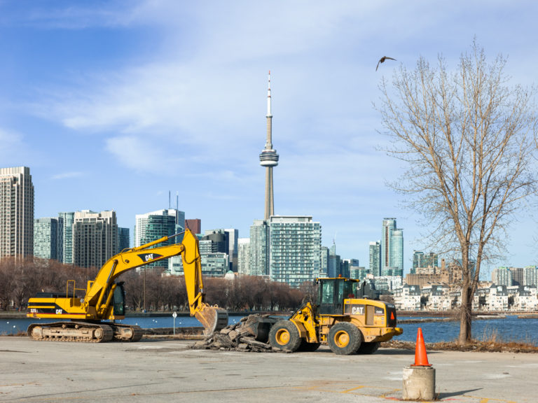 CAT Machinery and Toronto Skyline by the Waterfront