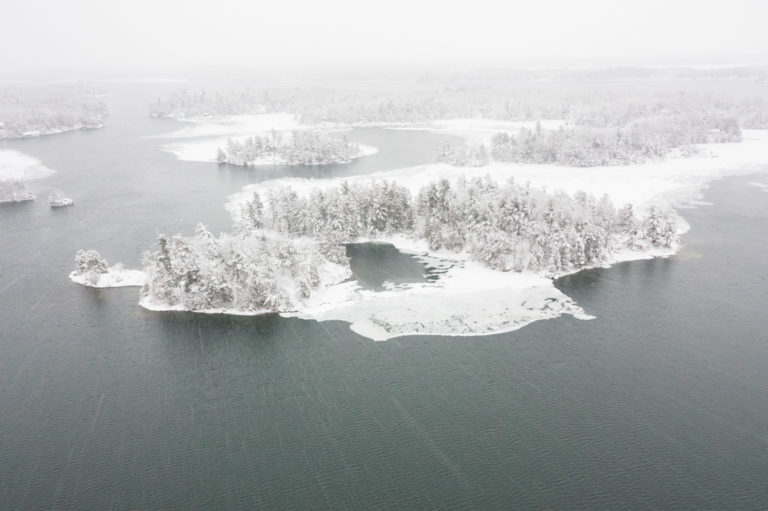 Snow Blankets Navy Islands on the River