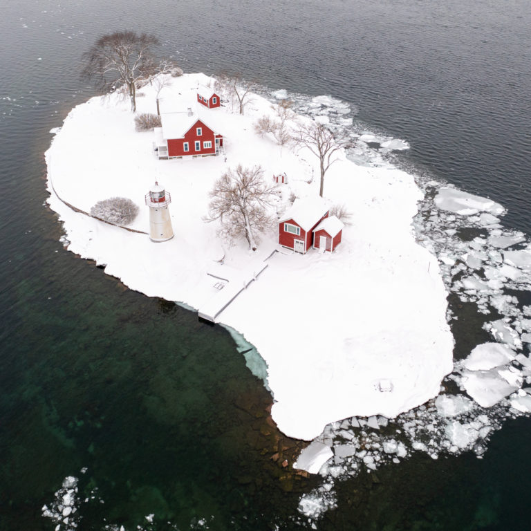 Historic Crossover Island Lighthouse After Snowfall