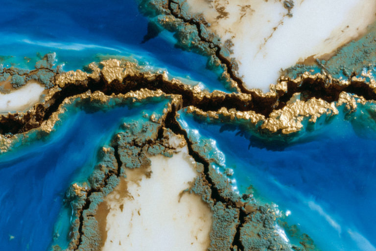 Shattered Blue Earth with Metallic Rifts