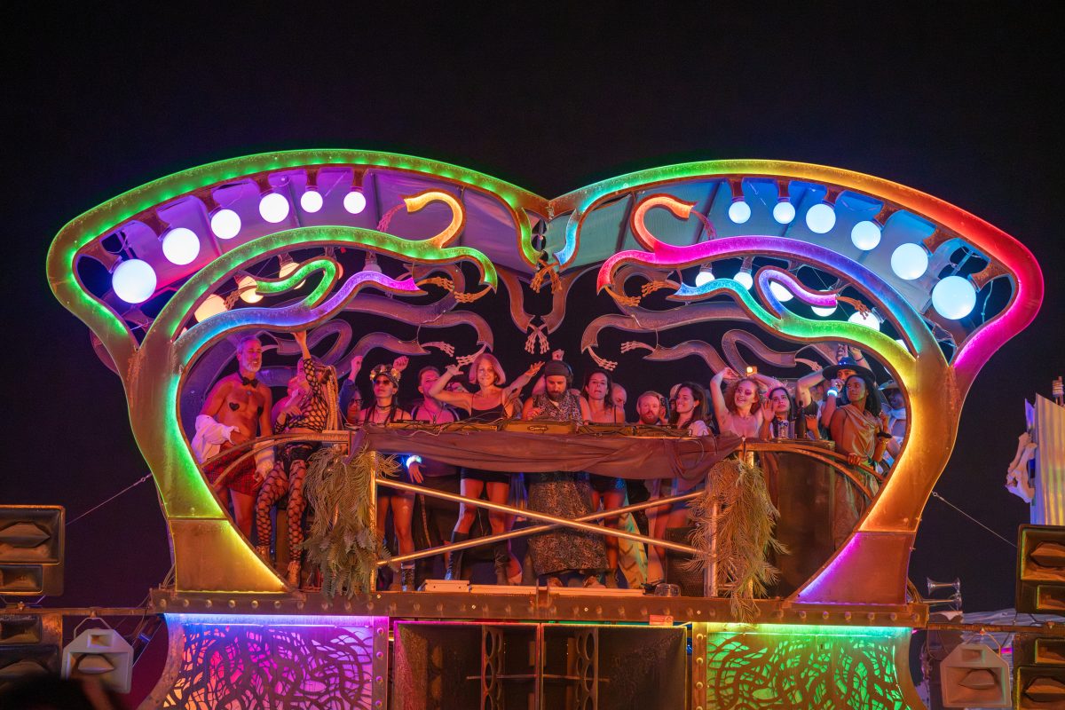 Participants Watch the Man Burn on Various Mutant Vehicles