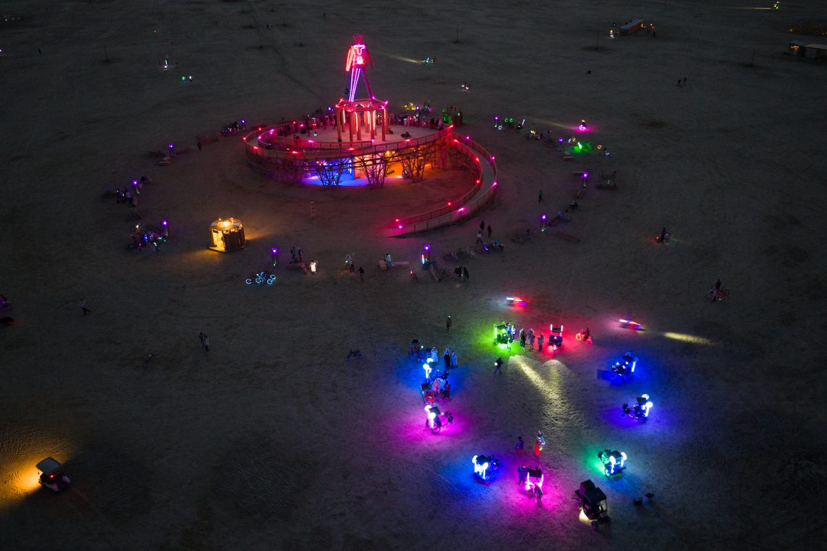 The Man and Colorful Bikes in a Circle