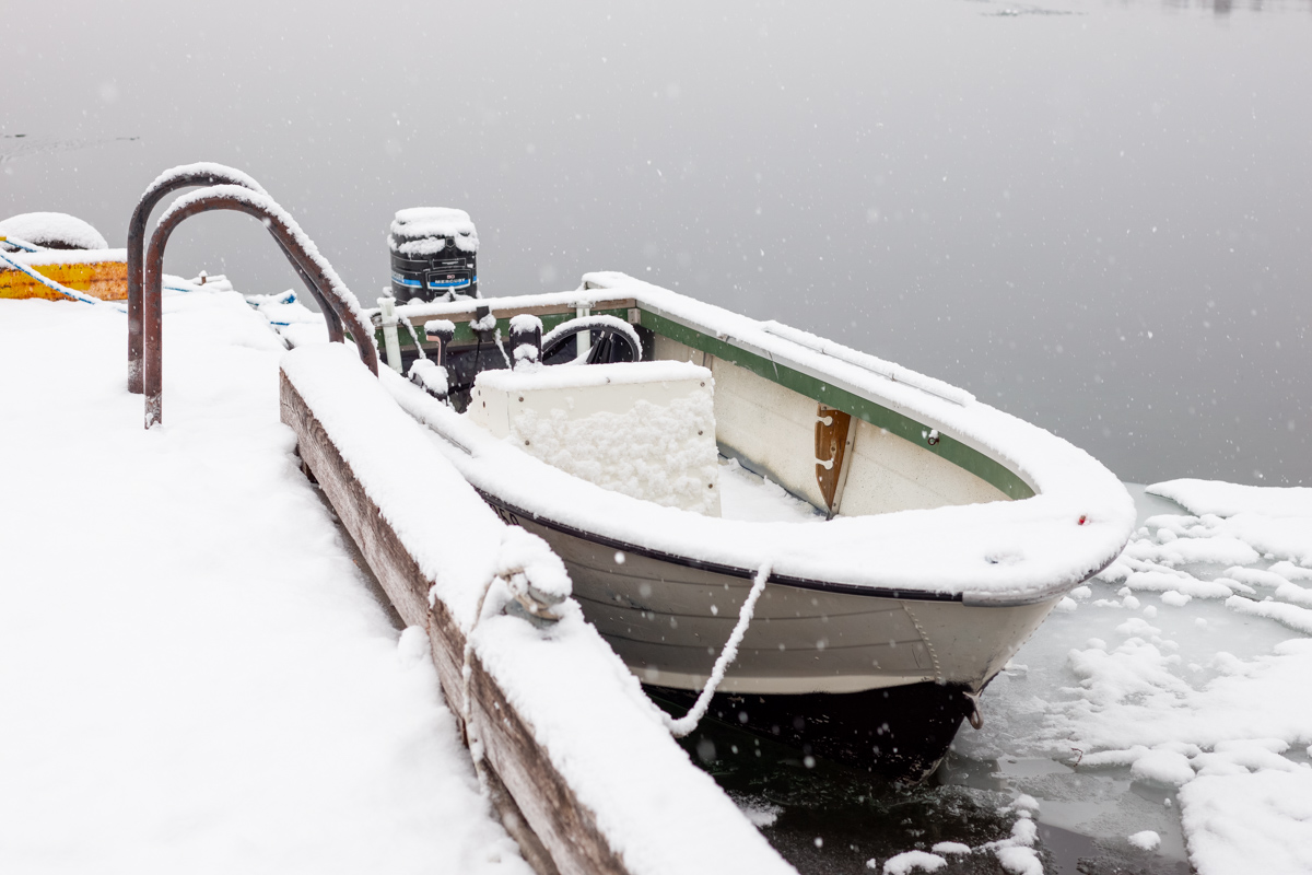 Moored Boat in Snowfall
