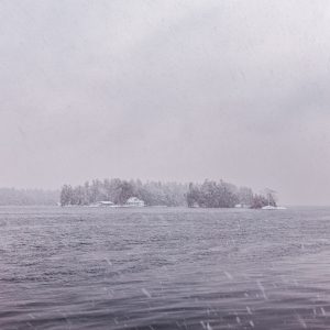 Snowfall Over Open Water