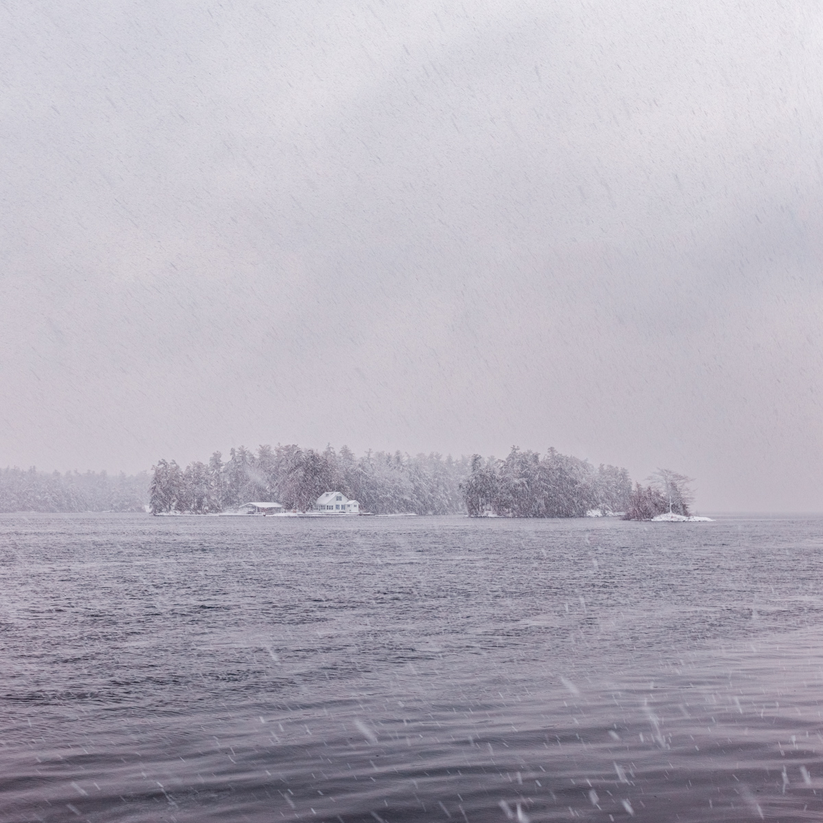Snowfall Over Open Water