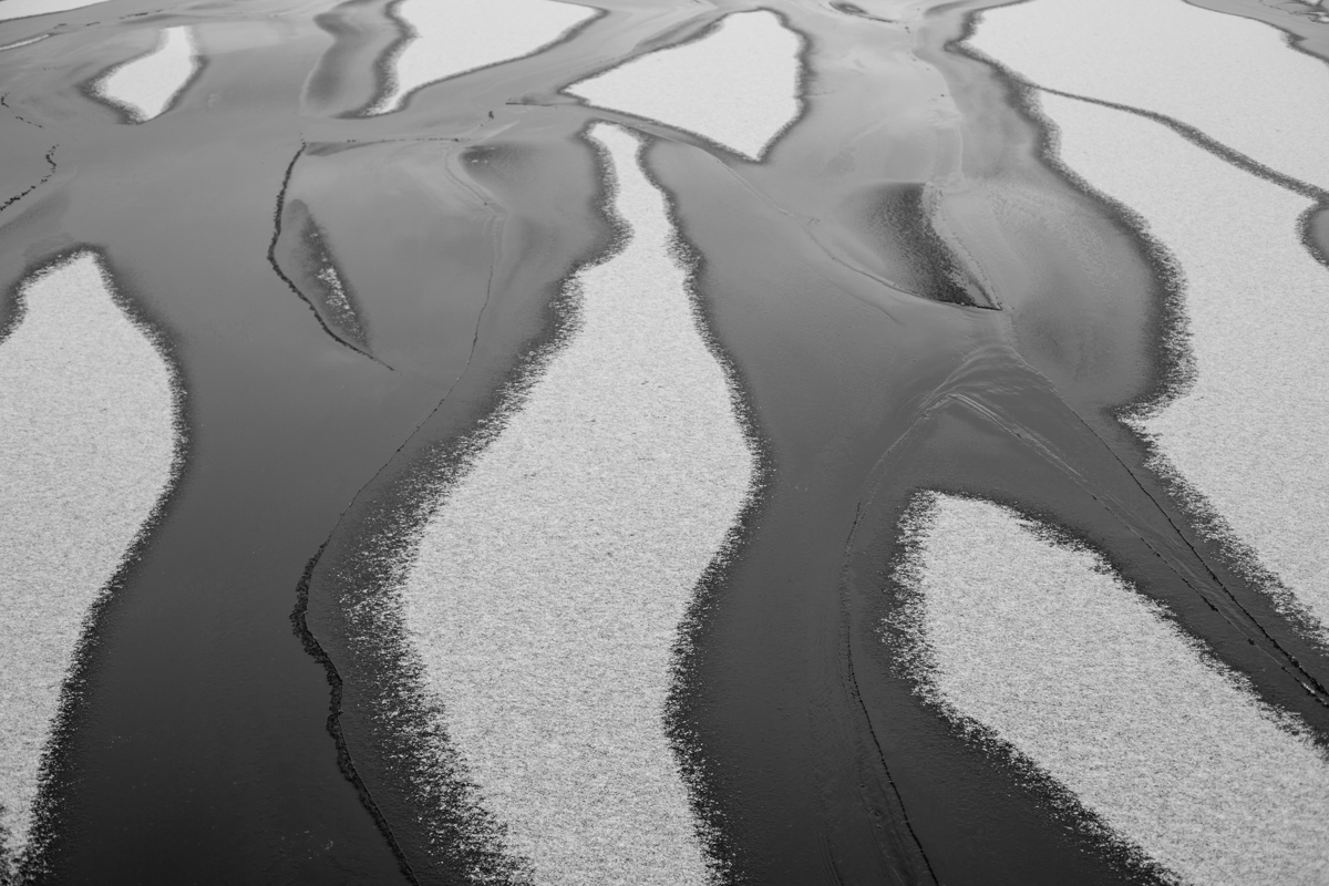 Frozen Channels and Drifted Snow