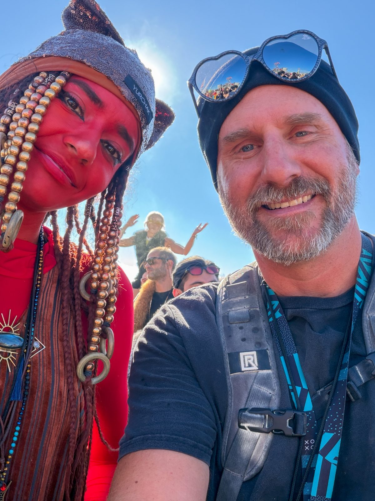 Red Paint and Beaded Braids