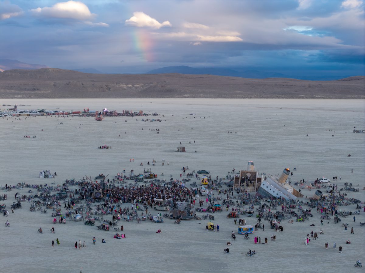 Rainbow Over a Morning Playa Gathering
