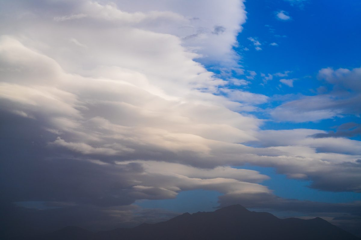 Lenticular Clouds Over the Mountains