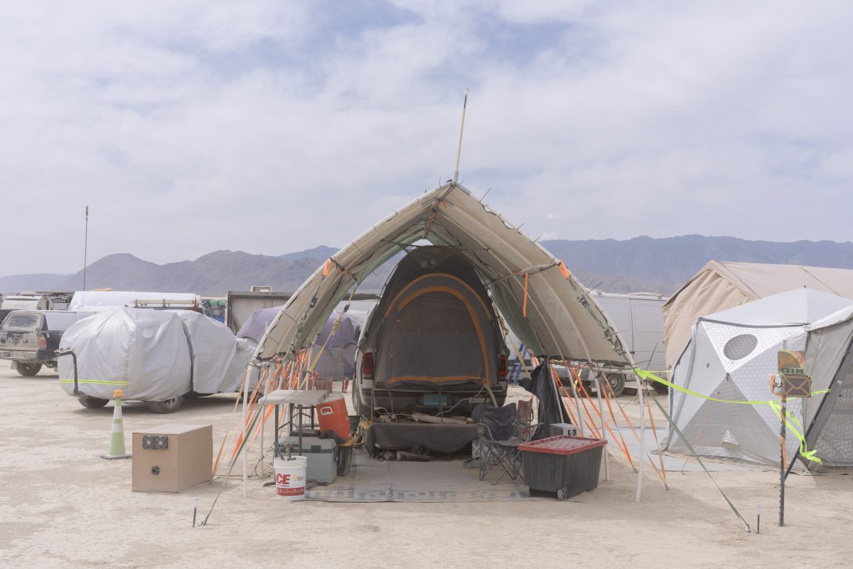 Truck Camp Under a Shade Arch