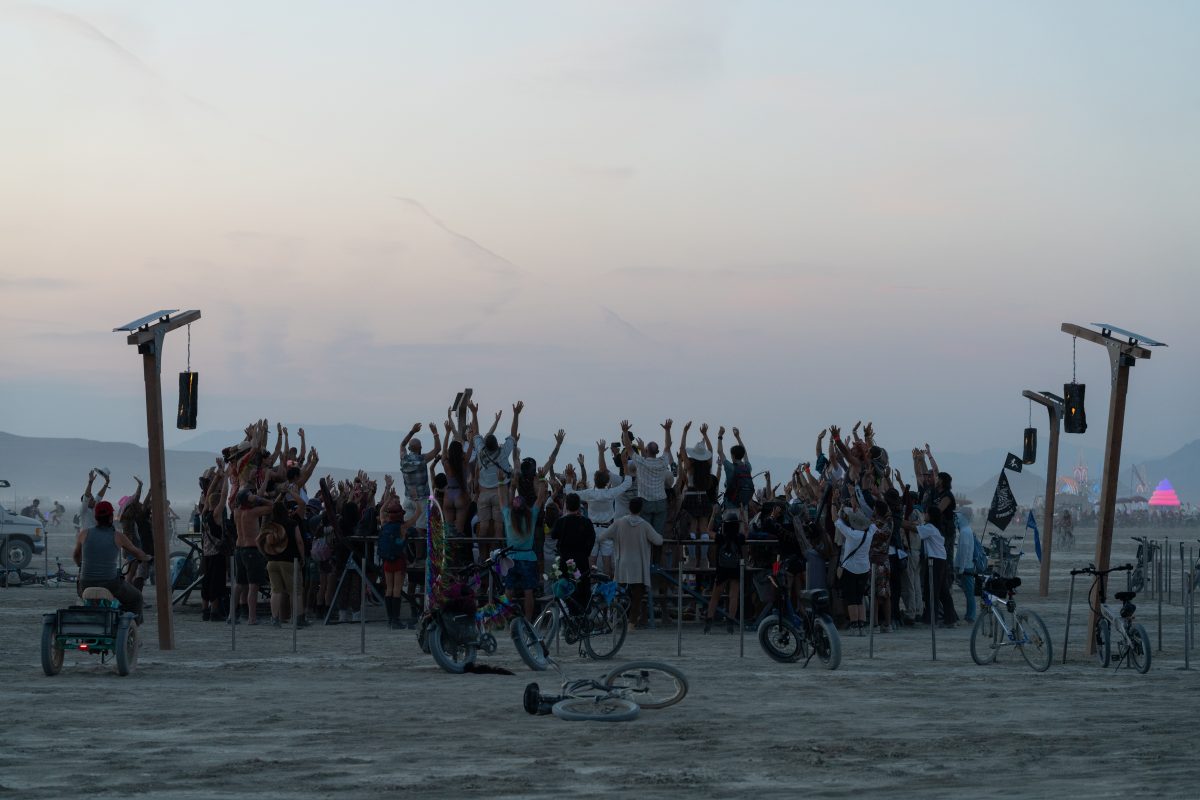 Hands Raised at the Temple Blessing - Earth Guardians