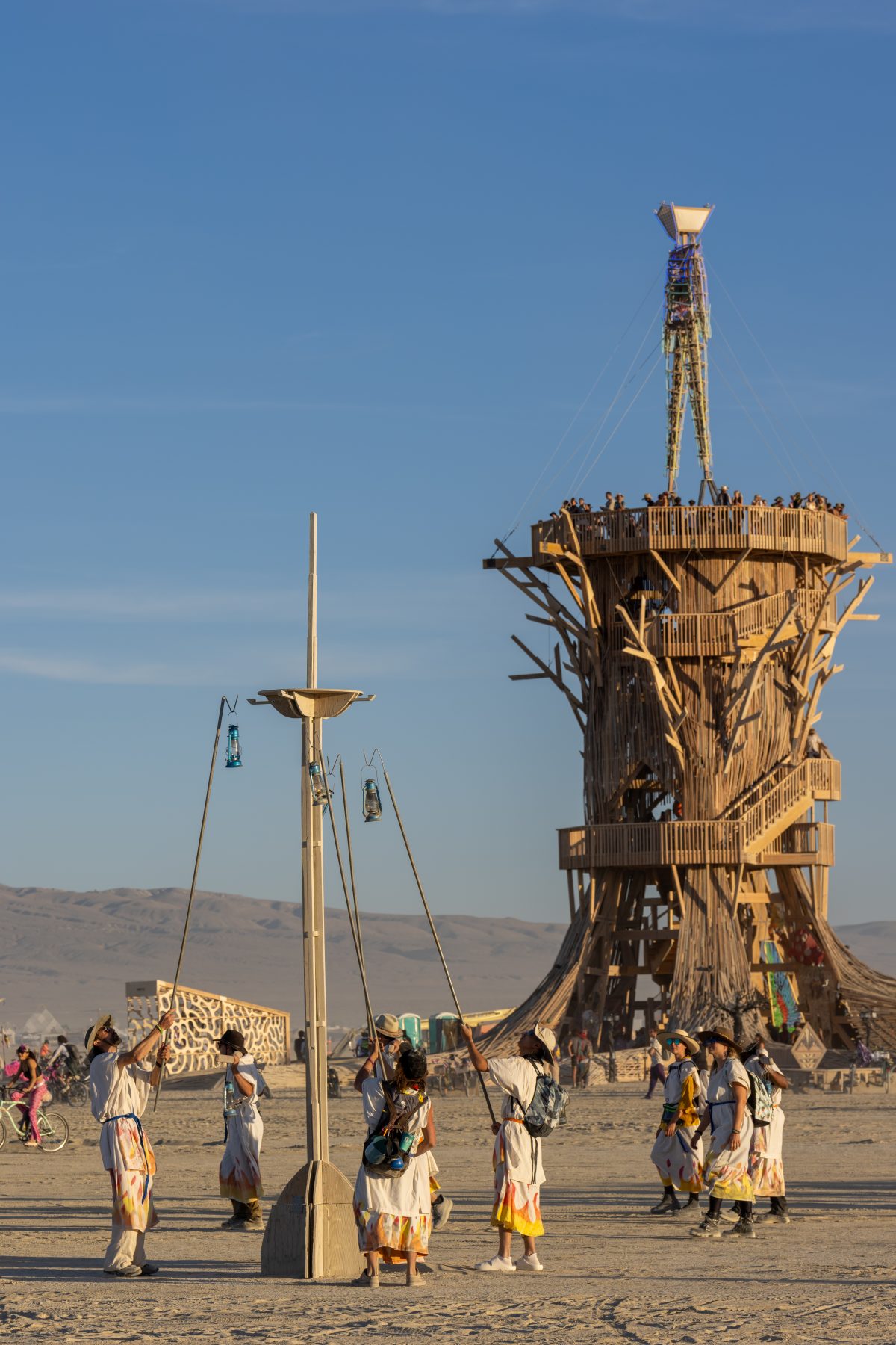 Lamplighters at Burning Man 2026 Man Base - Cryptomeria by Alexander Rose