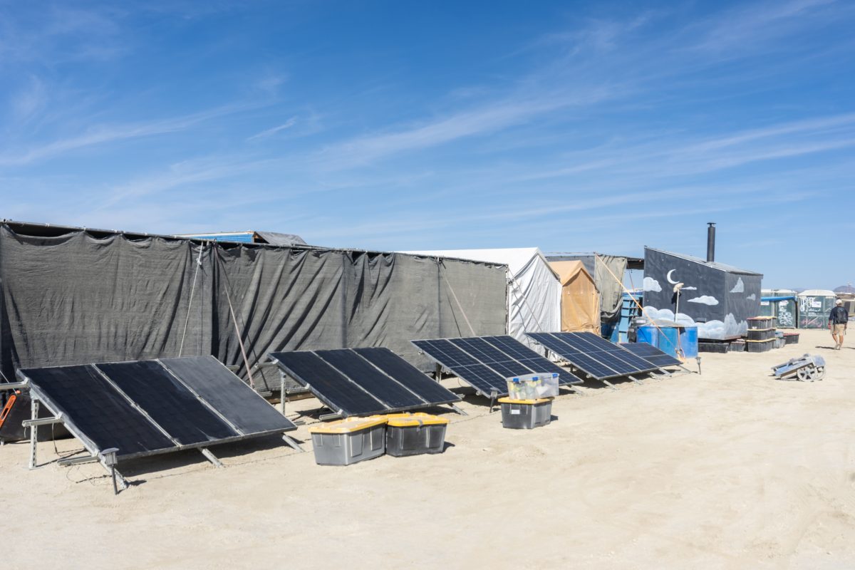 Solar Panels Behind Camp Shade