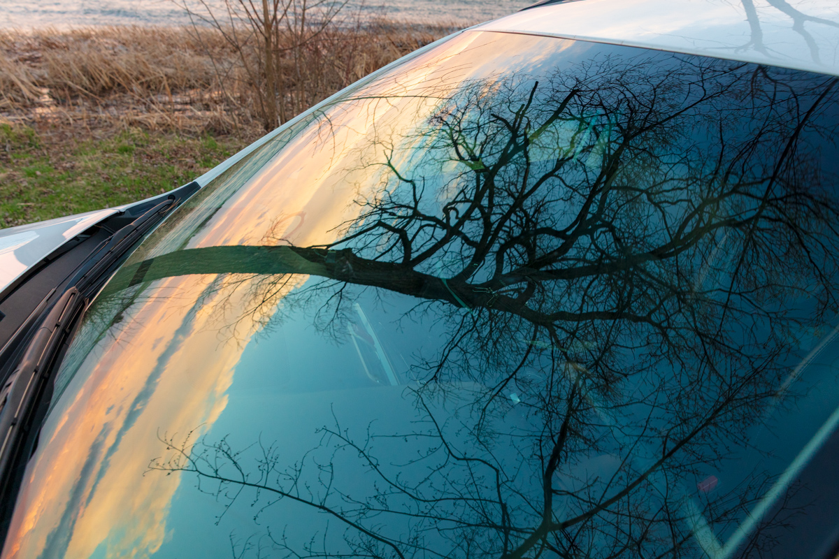 Storm Light Reflected on Car Hood